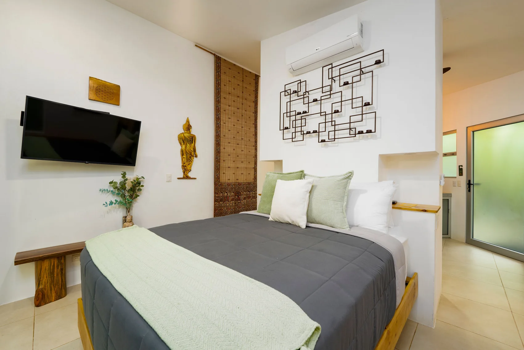 Mango bedroom, with the kitchenette beyond